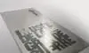 Plaque signalétique en inox gravée en surface par faisceau laser